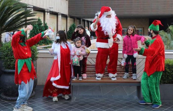 صور .. العالم هذا المساء.. لبنان تضع أشجار عيد الميلاد على أنقاض انفجار بيروت.. أفغانستان تحيى أقدم سباقات الخيل فى العالم.. الصين تستعد للاحتفال برأس السنة القمرية الجديدة